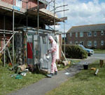 Asbestos Removal contractor in protective clothing